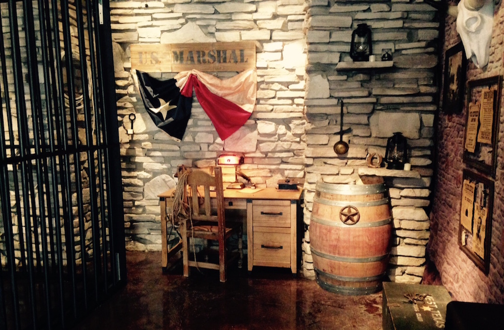 Close up of the marshal's desk in the Escape West Texas jail.