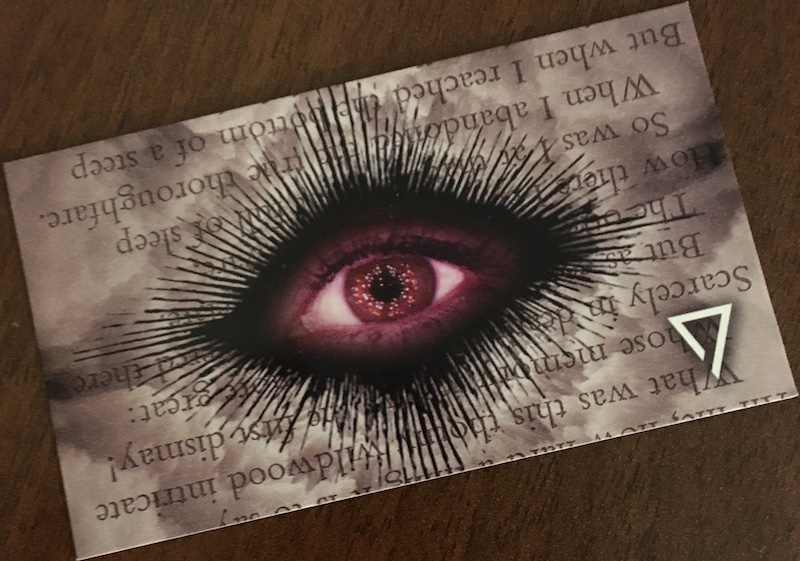 A mysterious card with an elaborate eye design on it.