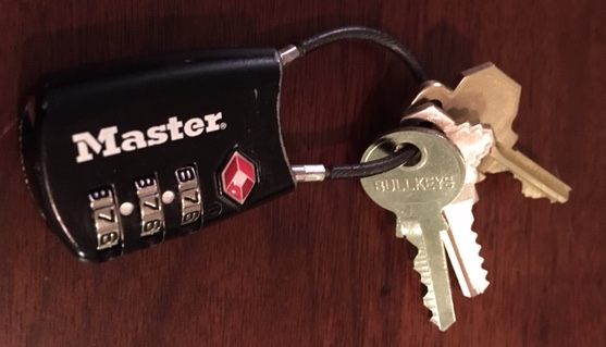 A small comination lock used as a keychain.