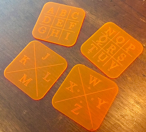 All 4 pieces of the Riddle Factory Freemason's Cipher key.