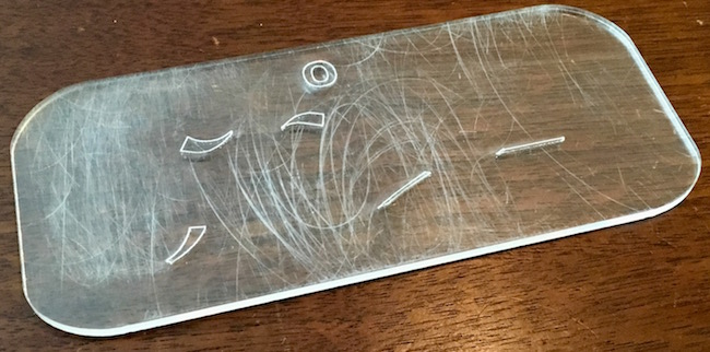 A piece of the Transparent Digit Puzzle scratched badly.