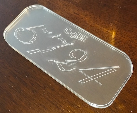 Transparent Digit Puzzle with all pieces stacked. It reads, "CODE 5724".