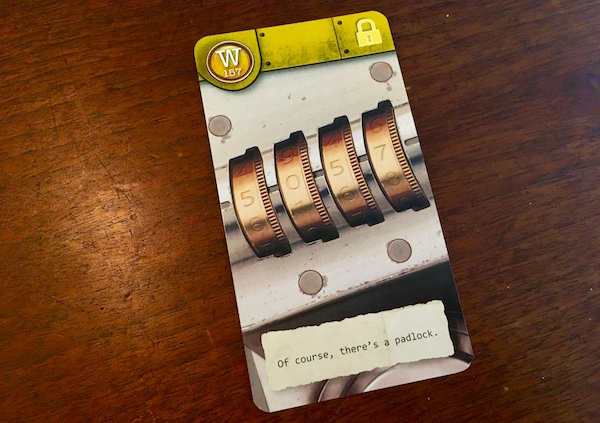 Yellow card depicting a combination padlock. The flavor text of the cards reads, "Of course, there's a padlock."