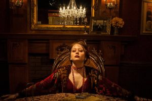 Madame Daphne holding a seance.