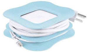 A quirky PowerCurl neatly wrapping a MacBook power cable.