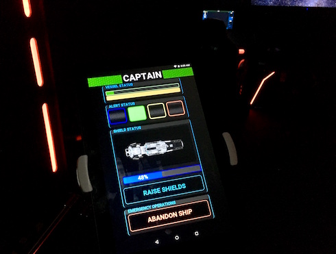 In-game: A captain's Android tablet with controls for the shields and emergency operations. 