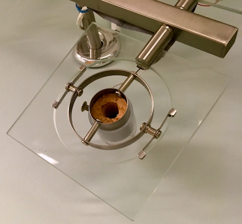 In-game: A strange metal glass, and cork contraption. 