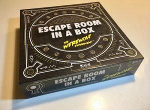 Escape Room in a Box: The Werewolf Experiment's black, white, and yellow box.
