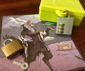 In-game: a green biohazard box locked with a plastic 3 digit lock, a gold plastic warded lock, and art depicting a female werewolf.
