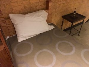 In-game: A seedy hotel bed.