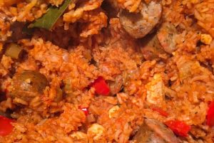 Close up of a pot of chicken and sausage jambalaya.