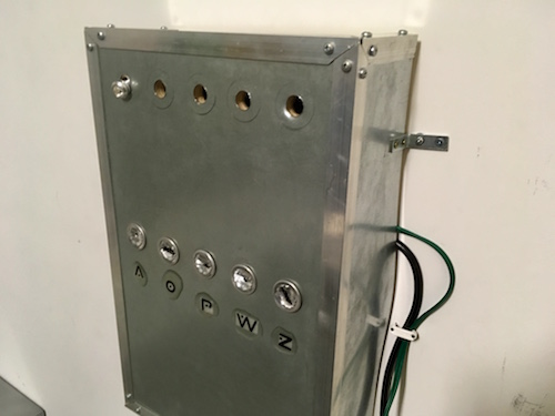 In-game: A beat up contraption with odd symbols on it.