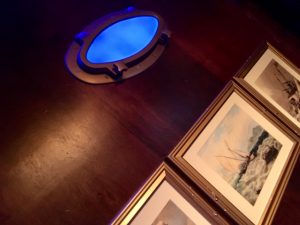 In-game: A porthole in the side of the ship.