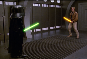 Lonestar & Dark Helmet squaring off in a Schwartz lightsaber fight.