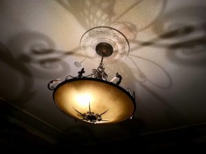 In-game: The ornate ceiling light fixture on the Honeymoon suite casing a a beautiful shadow.