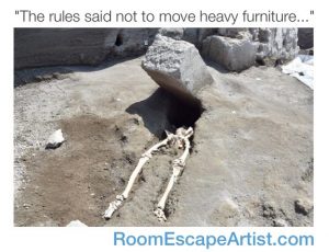 A skeleton crushed by a stone pillar reads, "The rules said not to move heavy furniture..."
