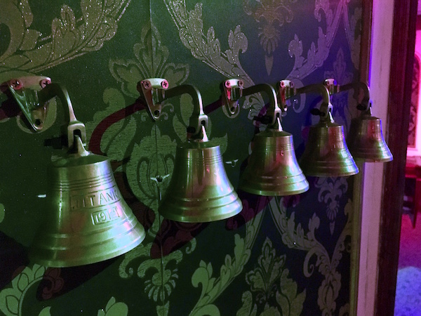 In-game: a series of bells labeled "TITANIC."
