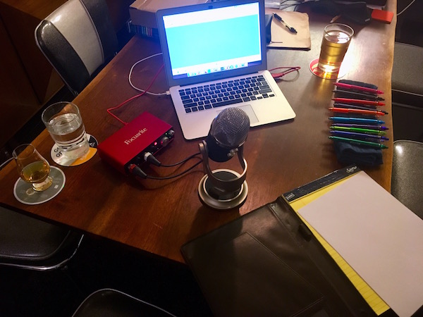 Ready to record, our computer, microphone, mixer, drinks, and colored pens were laid out. 