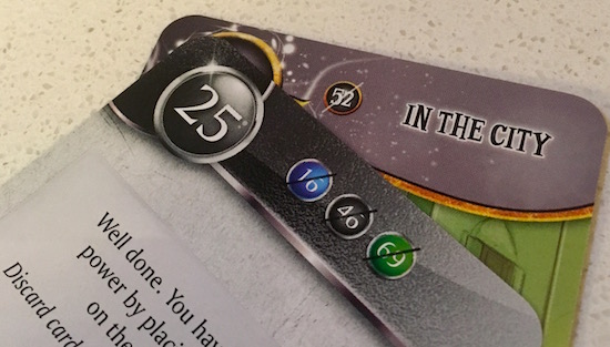 A tutorial card compared with an Oz card. The "discard" icon is noticeably smaller.