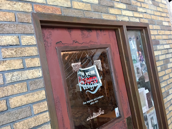 Game Exterior: The game's starting place, a mysterious rug shop.