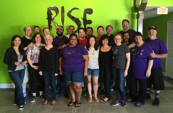 Lisa's bus gathered for a group photo at RISE.