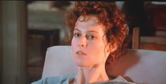 Dana slowly turning and noticing a strange light emanating from around a closed door.