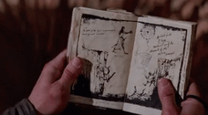 View of a journal depicting a Knight taking a leap of faith to get to the holy grail.
