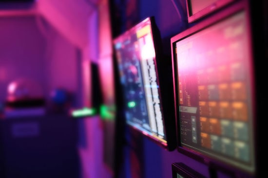 In-game: a pair of monitors mounted to a wall. 