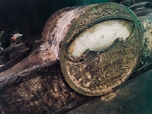 In-game: an old, ornate, and worn pressure meter.