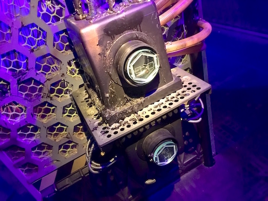 In-game: a strange contraption with tubes running to it.