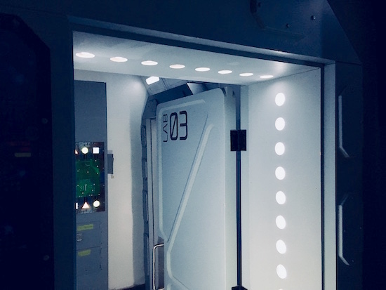 In-game: the futuristic doorway to Lab 03.