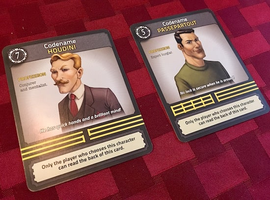 Two character cards, one for a mentalist codenamed Houdini, the other a burgler codenamed Passepartout.