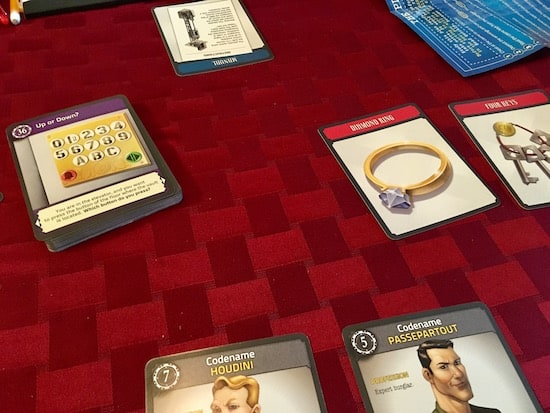 Mid-game, assorted cards are revealed on the table.