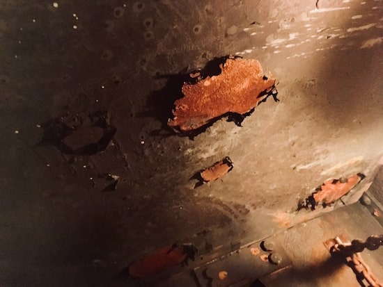 In-game: heavily weathered and rusting ceiling.