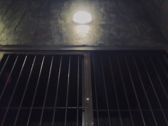 In-game: the bars for a cell in a concrete room.