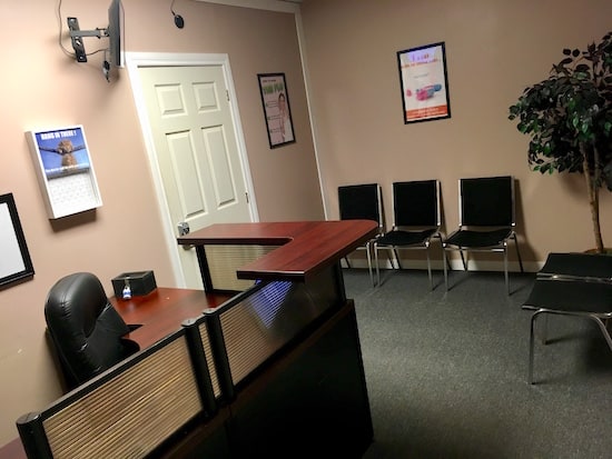 In-game: the clinic's waiting room. It looks like a convincing medical waiting room. 