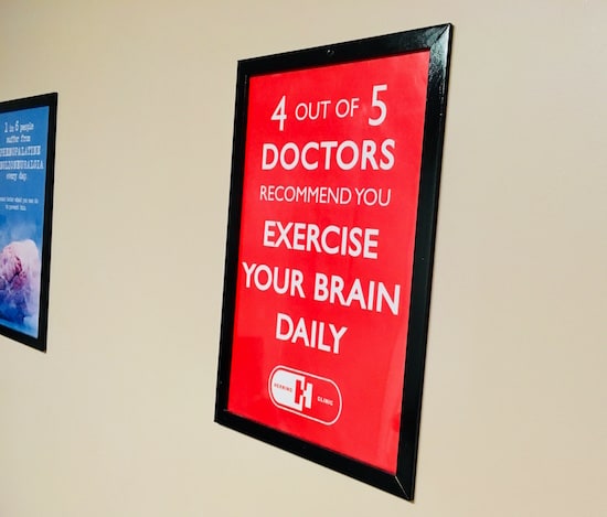 In-game: A poster that reads, "4 out of 5 doctors recommend you exercise your brain daily."