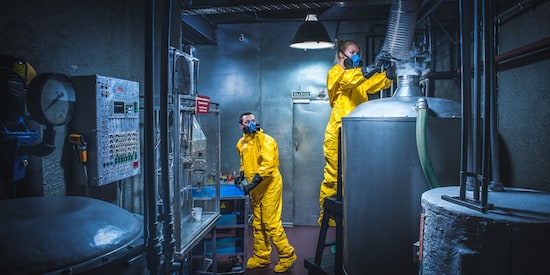 Claustrophobia game promo: two people in yellow suits and masks in a lab