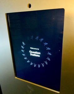 A touch screen reads, "Welcome to Question Stations"