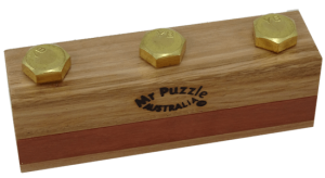 3 bolts protruding from an elegant block of wood labeled, "Mr Puzzle Australia"