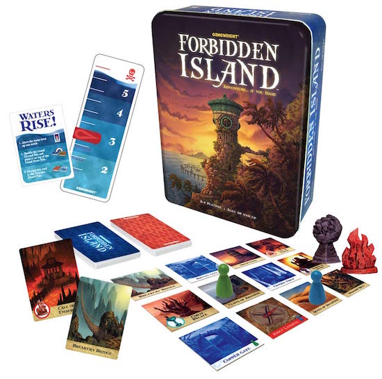 Forbidden Island's box with an assortment of cards, location tiles, and pieces.