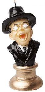 A candle made to look like the bust of Toht, the vile Nazi from Raiders of the Lost Ark.