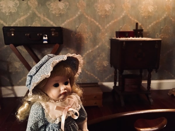 In-game: closeup of a creepy doll.