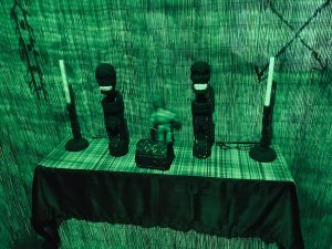 In-game: closeup of a voodoo shrine.