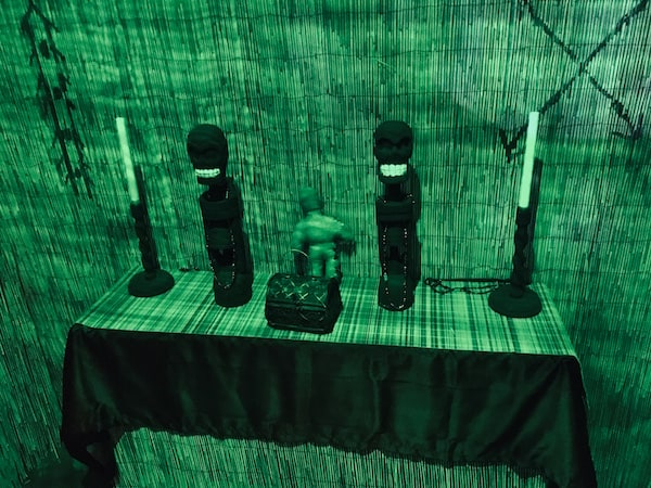 In-game: closeup of a voodoo shrine.