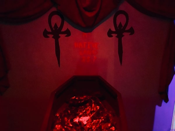 In-game: An open coffin lit red.
