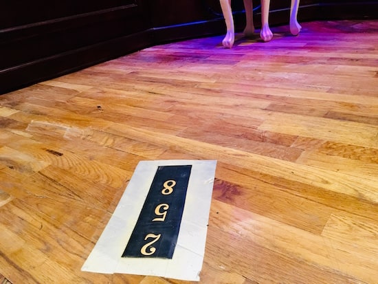 In-game: The number "2 5 8" mounted to the floor.