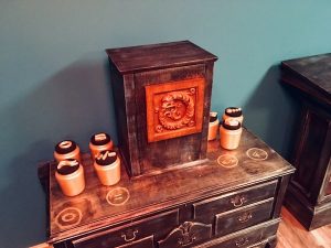 In-game: A chest with the depiction of an ouroboros; a snake eating its own tail.