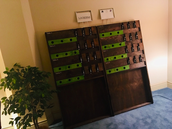 In-game: A wooden locker with sliding doors and a series combination locks.