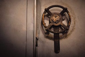 In-game: close-up of a wheel/ door handle.